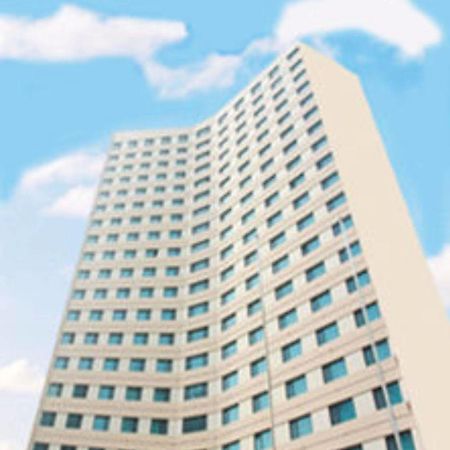 Overseas Chinese International Hotel Qingdao Exterior photo